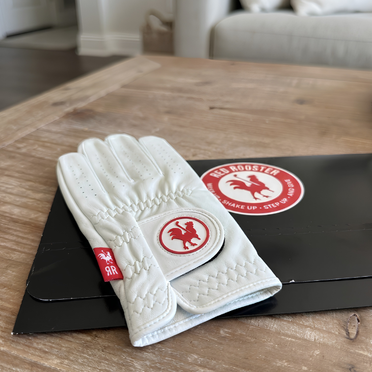 The Feather Canada - Red Rooster Golf Inc.